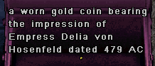 a worn gold coin